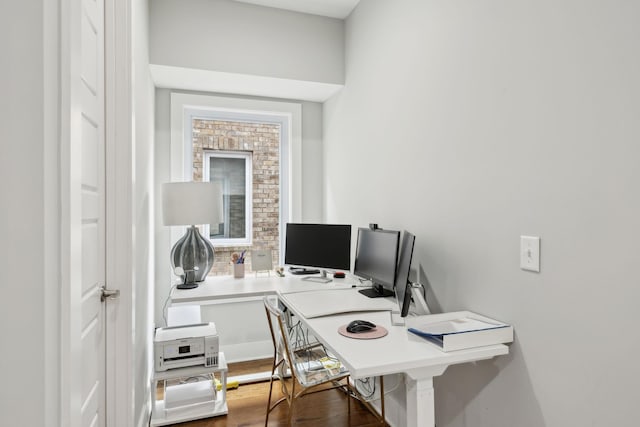 office area with wood finished floors