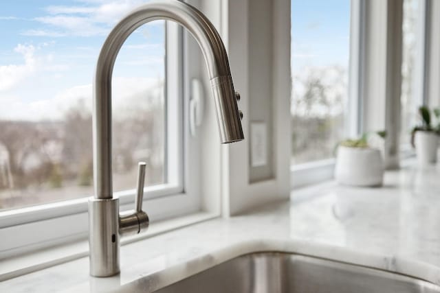 room details with light countertops and a sink