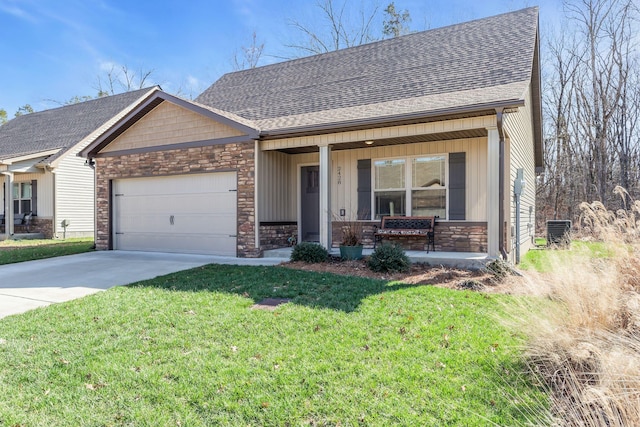 view of front facade with an attached garage, stone siding, roof with shingles, and concrete driveway