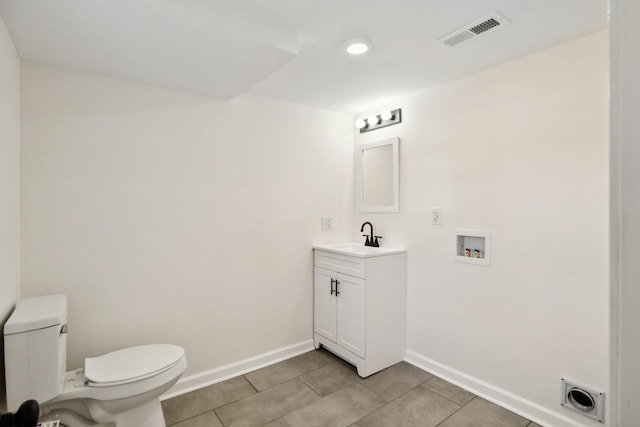 half bath featuring visible vents, baseboards, toilet, tile patterned flooring, and vanity