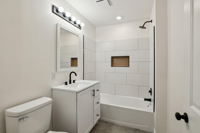 full bath with tile patterned flooring, shower / tub combination, vanity, and toilet