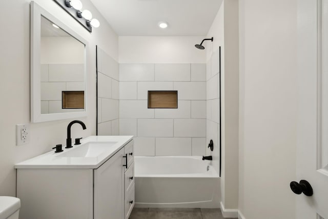 full bathroom featuring toilet, shower / bath combination, and vanity