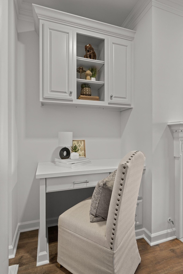 home office featuring ornamental molding, dark wood finished floors, and baseboards