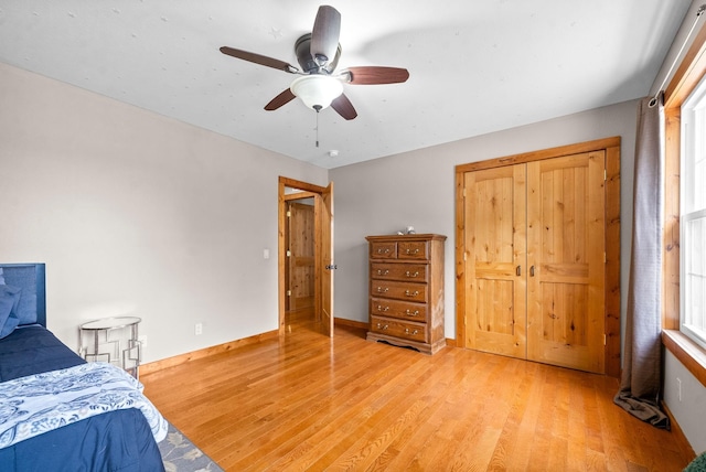 765 Heron Rd, Murray, KY 42071 - bedroom featuring ceiling fan, light wood-style flooring, and baseboards