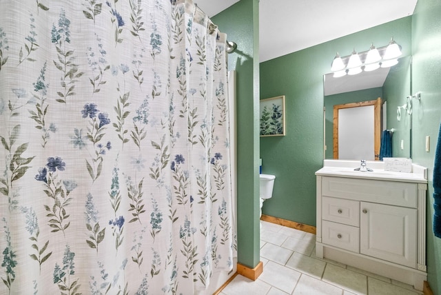 765 Heron Rd, Murray, KY 42071 - full bathroom featuring toilet, a shower with shower curtain, vanity, baseboards, and tile patterned floors
