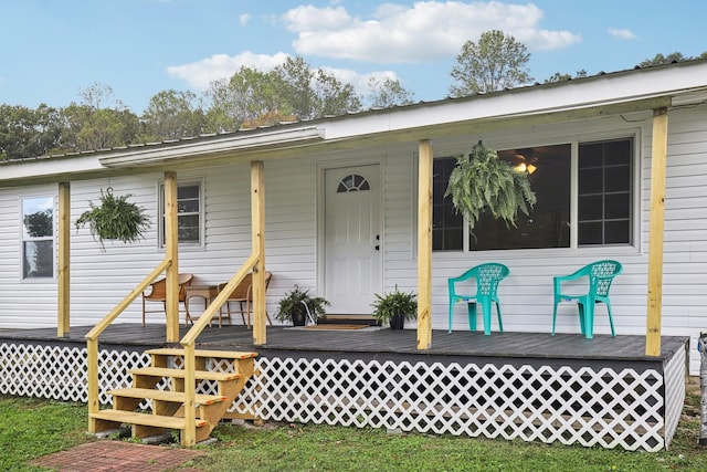 view of front of home with a wooden deck