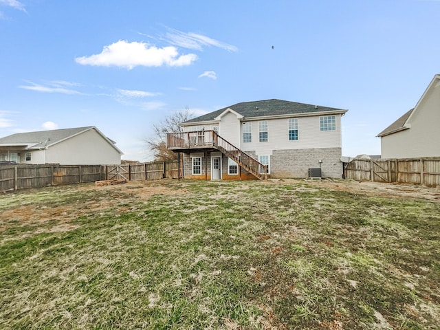 back of property with a fenced backyard, stairs, cooling unit, and a wooden deck