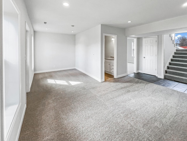 interior space with stairs, baseboards, tile patterned floors, and recessed lighting