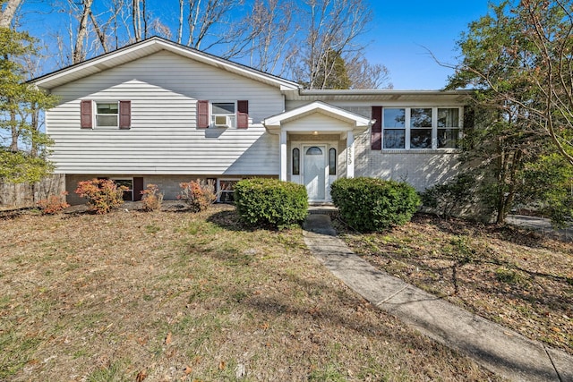 view of front of home with brick siding