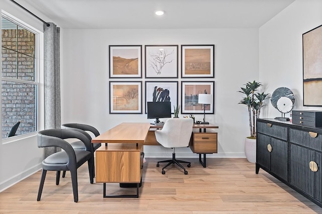 office featuring light wood finished floors, recessed lighting, and baseboards