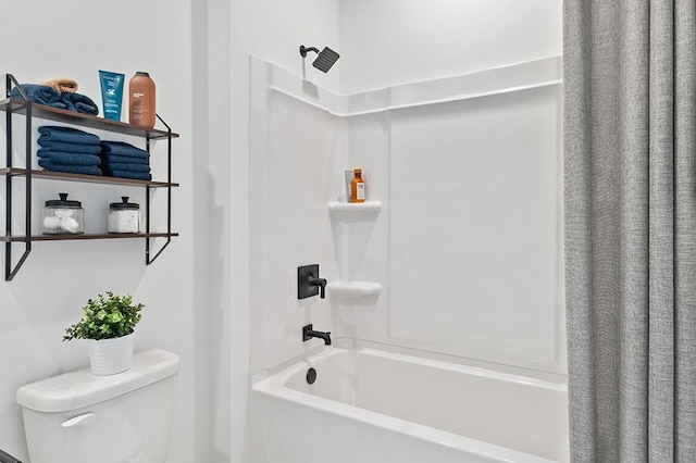 bathroom with toilet and shower / bath combination with curtain