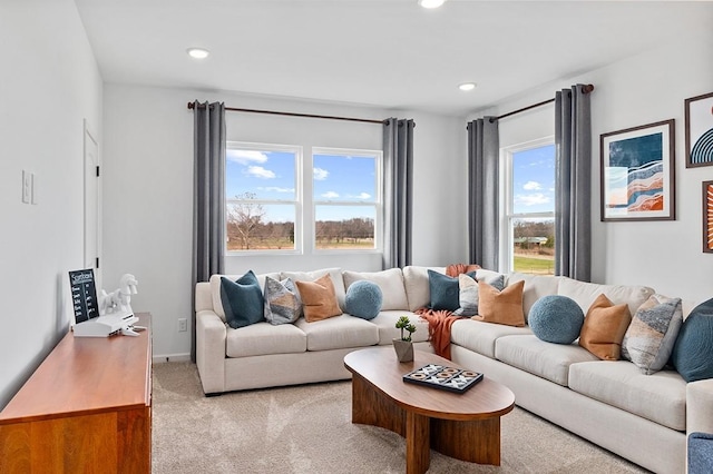 living area with carpet flooring and recessed lighting