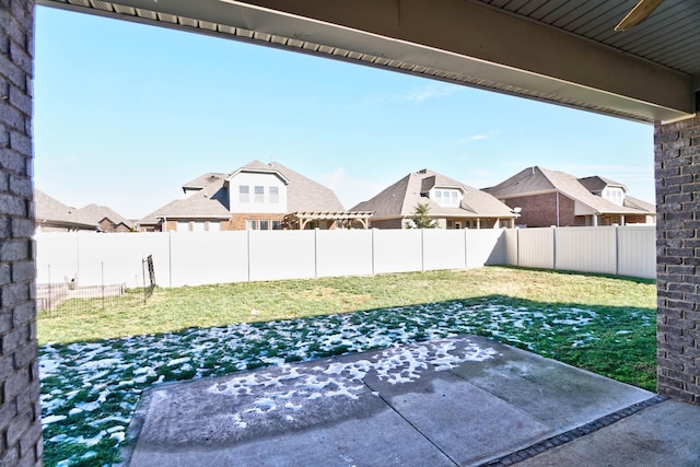 view of yard featuring a patio area and a fenced backyard