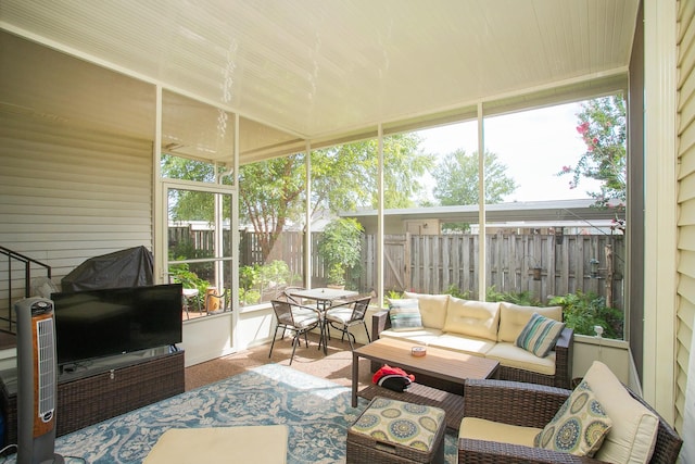 sunroom / solarium with a healthy amount of sunlight