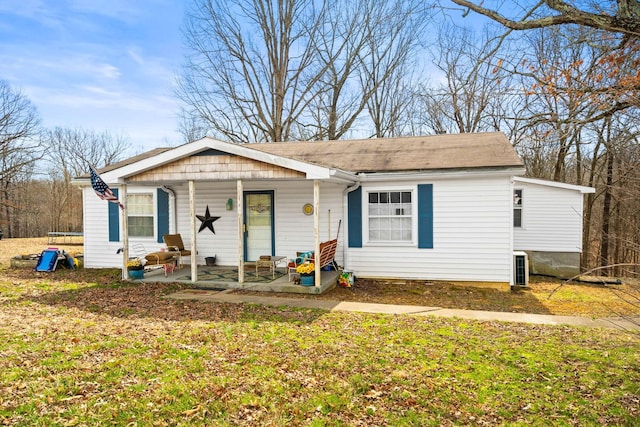 view of front of property featuring covered porch