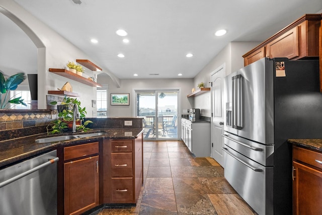 kitchen with stainless steel appliances, recessed lighting, a sink, and open shelves