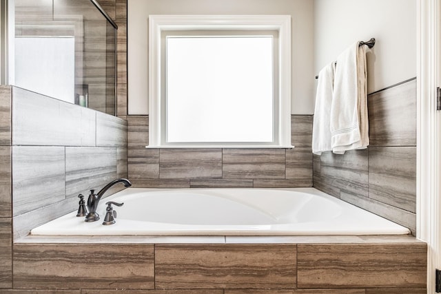 full bathroom featuring a bath