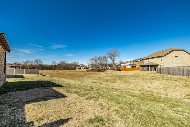 view of yard featuring fence