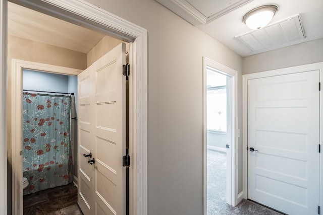 bathroom featuring baseboards, visible vents, and a shower with shower curtain