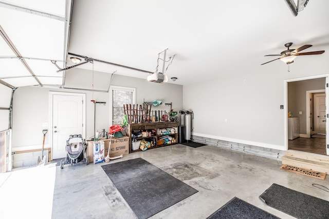 garage with baseboards and a garage door opener