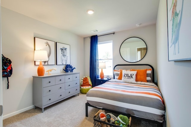 bedroom with light carpet, baseboards, and visible vents