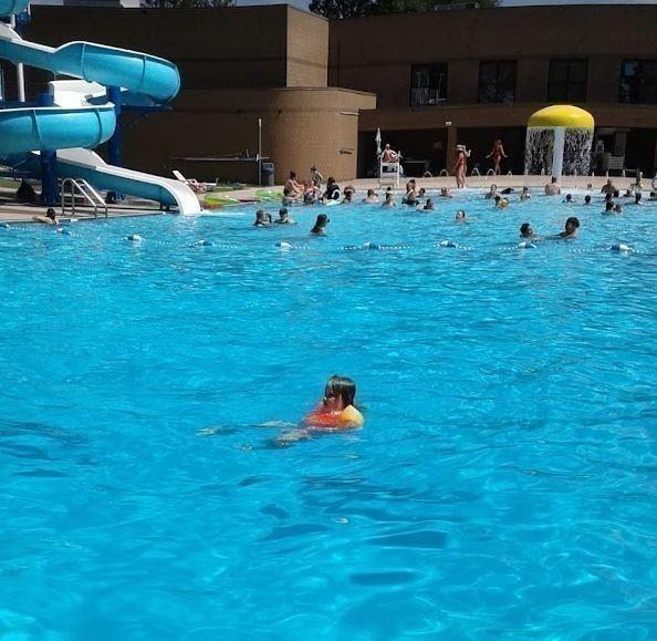 view of pool with a water slide