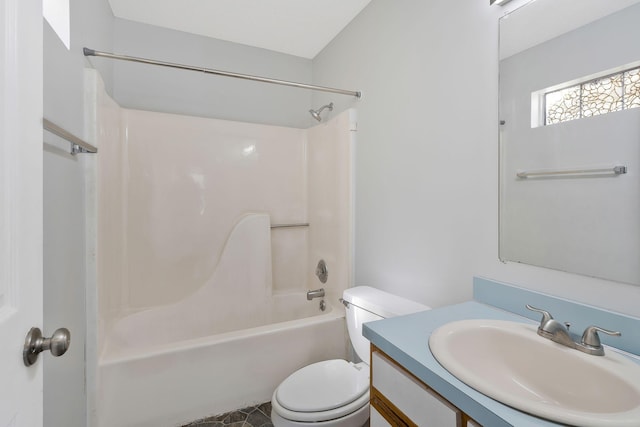 bathroom with toilet, bathtub / shower combination, and vanity