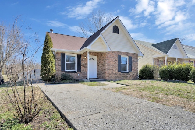 view of front facade featuring brick siding