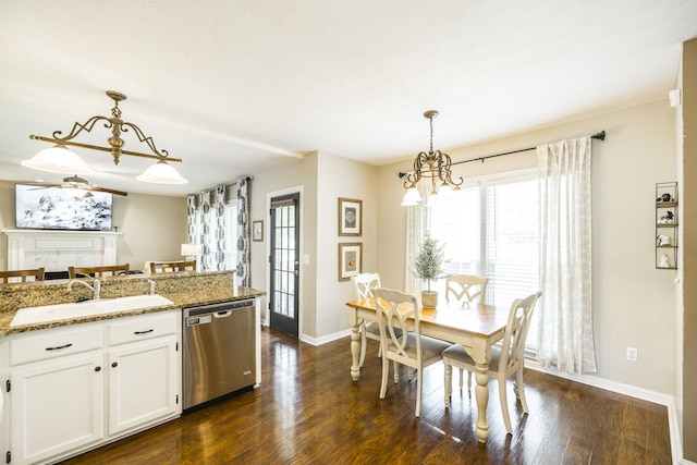 kitchen featuring a sink, white cabinetry, dark wood finished floors, and dishwasher