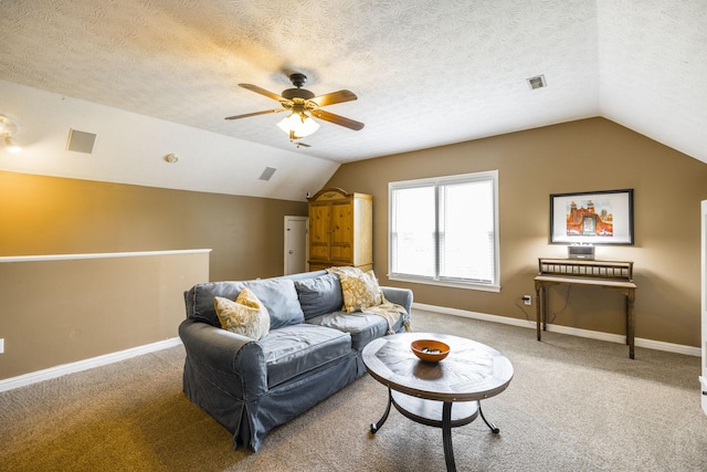 carpeted living area featuring lofted ceiling, baseboards, visible vents, and a textured ceiling