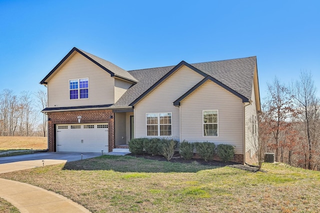 traditional-style house featuring an attached garage, brick siding, a shingled roof, concrete driveway, and a front lawn