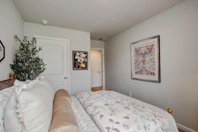 bedroom with visible vents