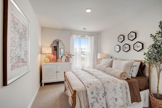 bedroom featuring carpet flooring, visible vents, and baseboards