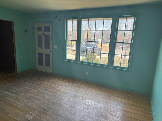 unfurnished room featuring wood finished floors