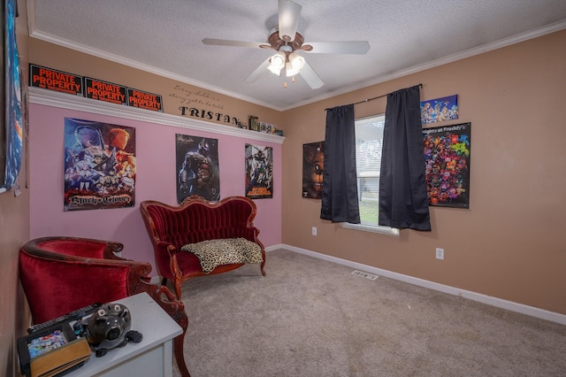 living area featuring carpet, visible vents, a textured ceiling, and ornamental molding