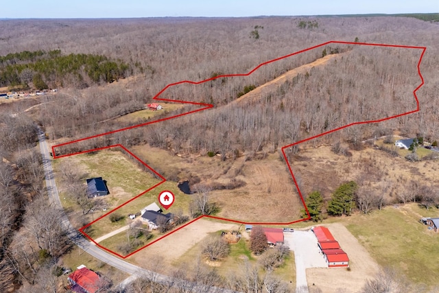 birds eye view of property featuring a rural view