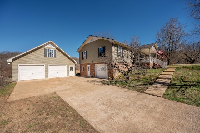 view of front of house featuring brick siding and driveway