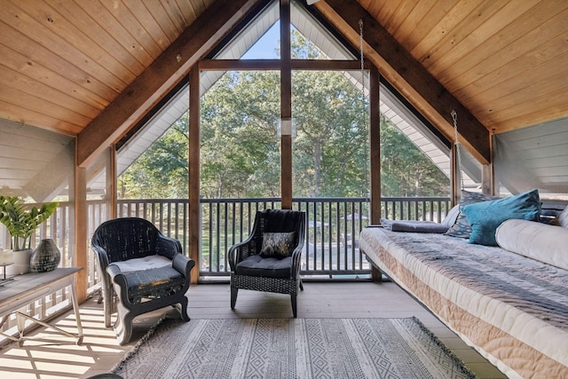 sunroom featuring wooden ceiling and vaulted ceiling with beams