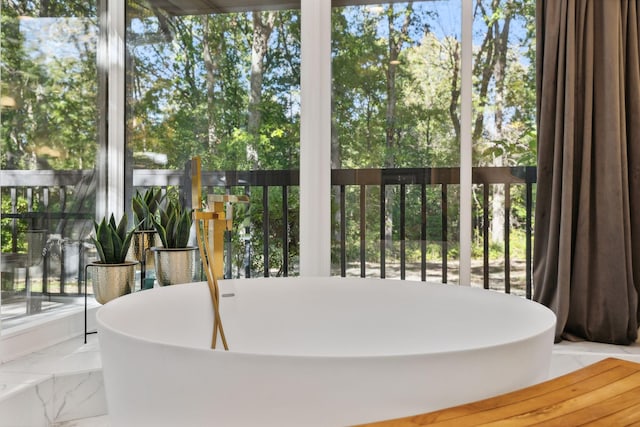 sunroom with a healthy amount of sunlight