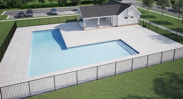 view of pool featuring a fenced in pool, an outbuilding, a lawn, a patio area, and fence