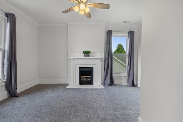 unfurnished living room featuring carpet, a fireplace with flush hearth, visible vents, and crown molding