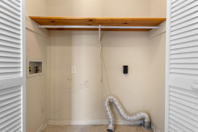 laundry room featuring laundry area, hookup for a washing machine, baseboards, and hookup for an electric dryer