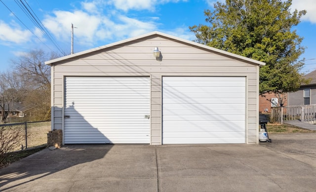 detached garage with fence