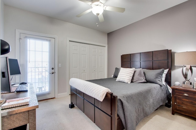 bedroom featuring light carpet, baseboards, a ceiling fan, and a closet