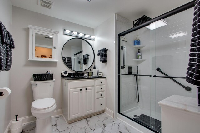 full bath featuring marble finish floor, visible vents, toilet, a stall shower, and baseboards