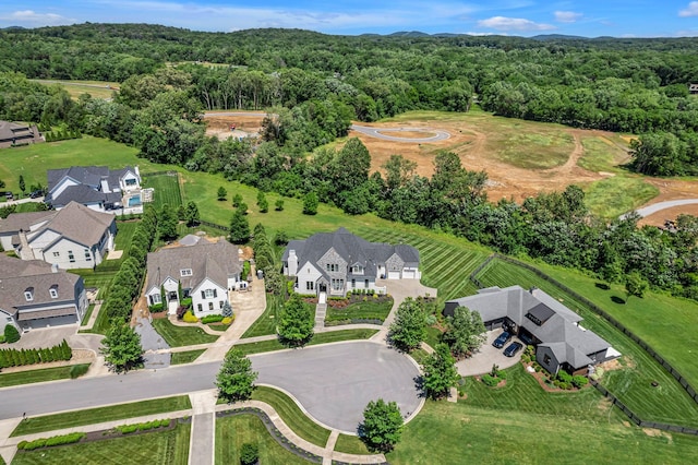 7108 Mason Grove Ct, College Grove, TN 37046 - aerial view of property and surrounding area with a heavily wooded area and nearby suburban area