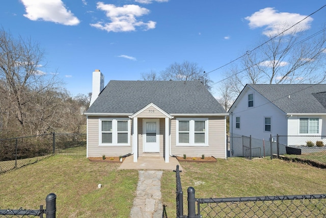 bungalow-style home featuring roof with shingles, a front lawn, a chimney, and a fenced backyard