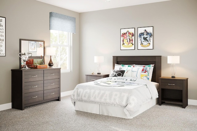 carpeted bedroom featuring baseboards