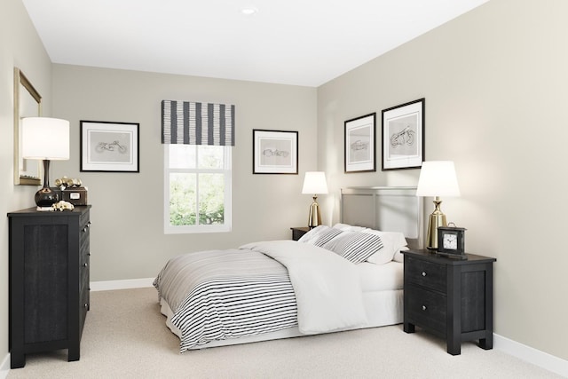 carpeted bedroom featuring baseboards