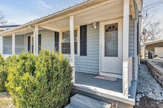 doorway to property featuring a porch